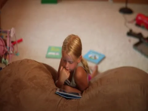 Dolly In Girl With Tablet 스톡 동영상 12063748