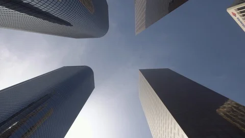 Dolly gliding looking up view of modern skyscrapers in Los Angeles city USA Stock Footage 99116410
