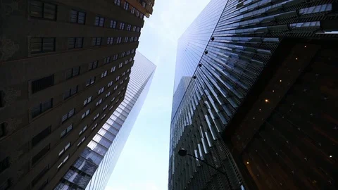 Dolly gliding looking up view of modern skyscrapers in NYC financial business  Stock Footage 117815330