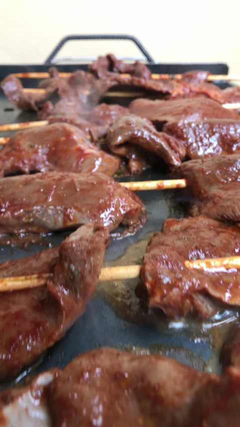 Dolly in of grilled anticuchos. Stock Footage 286280580