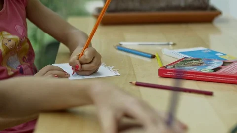 Dolly of hands drawing Stock Footage 78764194