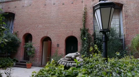 Dolly by Lamp in Courtyard Stock Footage 931842
