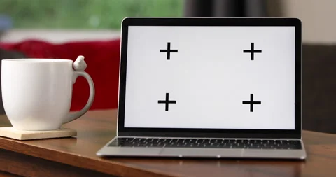 Dolly into laptop with coffee cup Stock-Footage 165266609