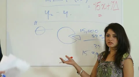 Dolly left from college student explaining the math problem Stock Footage