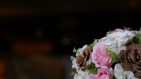 Dolly left to reveal flower table setting Stock Footage 106652042