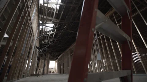 Dolly Left Right Low Angle From Under Ladder Wood Framing Construction Site Stock Footage 336325911
