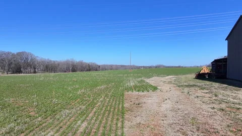 Dolly Left Then Right Of The Corner Of A Barn And Some Pasture Stock Footage 303018026