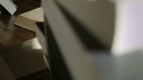 Dolly Motion Studio Shot of Big Books Stacked on a Desk at Night Stock Footage 57741047
