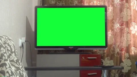 Dolly Move Into a Big Screen TV With Greenscreen Stock Footage 75913520
