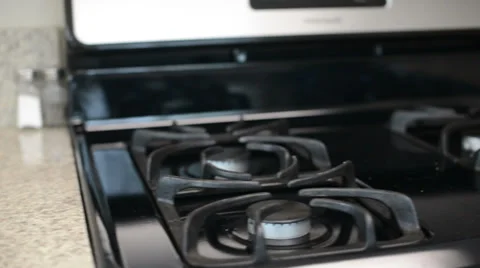 Dolly move on tea kettle on gas stove Stock Footage 36775764