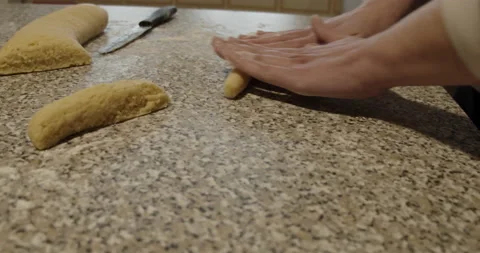 Dolly movement with slow motion of hands of woman prepares homemade dough Stock Footage 152152888