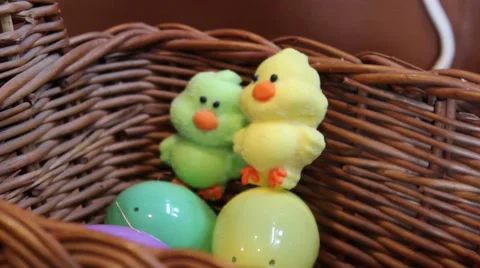(Dolly Out) Easter Basket with Duck Candy and Matching East Eggs Stock Footage 63011827