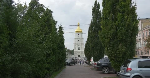 The Dolly Out Shot of the Bell Tower of St.michael`s Golden Domed Monastery in Stock Footage 52903979