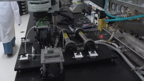 Dolly over to a laser microscope Stock Footage 106901145