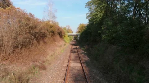 Dolly in over train tracks Stock Footage 134825878