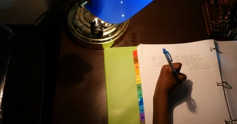 Dolly Overhead Child doing Homework 動画素材 91271408