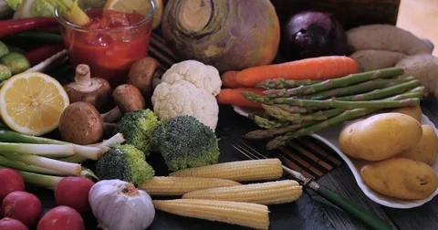 Dolly panning view of an assortment of fresh, healthy, organic vegetables Stock Footage 72949432
