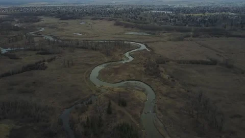 Dolly push in from drone of creek Stock Footage 167565738