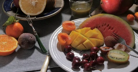 Dolly push in view of an assortment of fresh, healthy, organic fruits Stock Footage 72379525