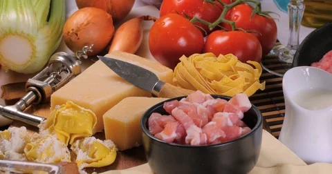 Dolly push in view of ingredient for bolognese sauce Stock Footage 74069730