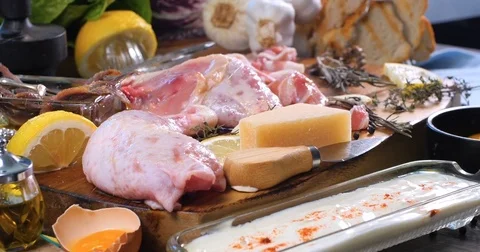 Dolly push in view of ingredients for a delicious Caesar's salad Stock Footage 75777600