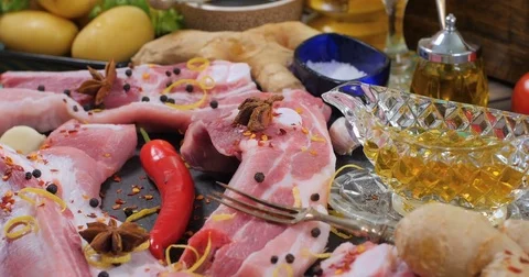 Dolly push in view of ingredients for delicious braised sticky king pork ribs Stock Footage 76447403