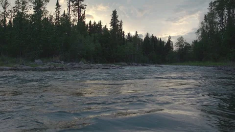 Dolly in on a river rapid at dusk Stock Footage 88301754