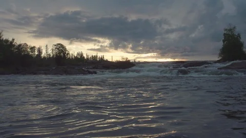 Dolly in on a river waterfall at dusk 스톡 동영상 88301734