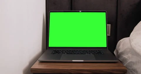 Dolly shoot of the laptop computer stying on the table in hotel room. Stock Footage 136744659