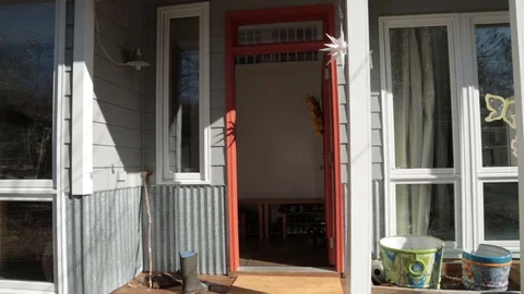 Dolly Shot Approaching Front Door of Family House 動画素材 104263001