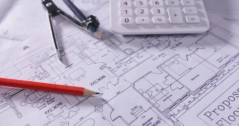 Dolly Shot Of Architectural Tools On Blueprint At Table 4K Stock Footage 86084878