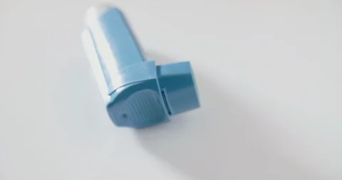Dolly Shot Of Blue Inhaler On Table Stock Footage 92365748