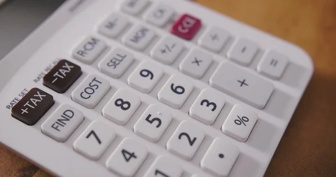 Dolly Shot Of Calculator On Table 4K Stock Footage 86084232