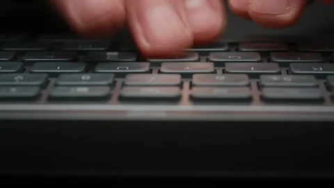 Dolly shot close-up timelapse male hands typing on keyboard with motion blur Stock-Footage 340926432