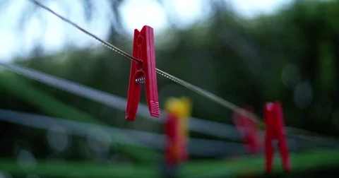 Dolly shot of clothespin on the wire Stock Footage 84769326