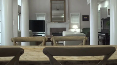 Dolly shot of a couple using a laptop in a dining room Stock-Footage 73249152