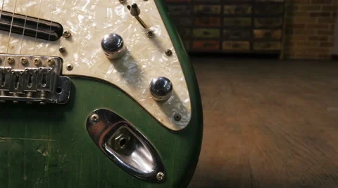 Dolly shot of electric guitar in studio Stock Footage 59865312