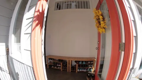 Dolly Shot Entering Through Front Door of Colorful House Видео 104262979