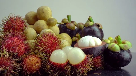 Dolly shot of fresh fruit on white background Stock Footage