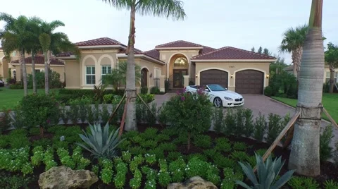 Dolly shot of front yard property 7717 Eden Ridge Way Stock Footage 55292238