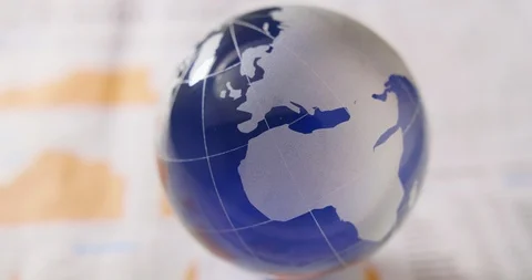 Dolly Shot Of Glass Sphere On Table 4K Stock Footage 86084354