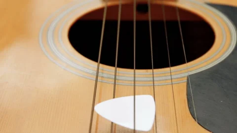 Dolly shot  on the guitar. Stock Footage 154975436