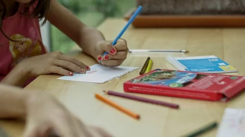 Dolly shot of hands drawing Stock Footage 78768335