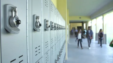 Dolly Shot Of High School Students Walking In Hallway Stock Footage