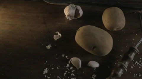 Dolly shot of the ingredients of garlic mashed potatoes Stock Footage 56467933