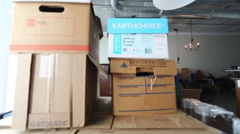 Dolly Shot of Moving Boxes In Loft Living Room Stock Footage 46631873