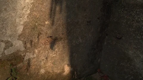 Dolly shot of moving wind chime on wall Stock Footage