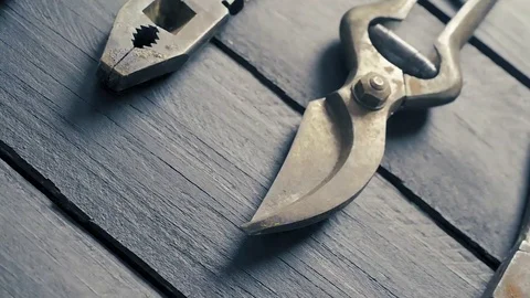 Dolly shot on old tools on a dark table Vídeo Stock 74723623