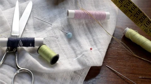 Dolly shot over useful sewing Stock Footage 72945022