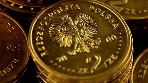 Dolly shot over various gold coins Gold Treasure Saving money and loan for Video stock 334028028